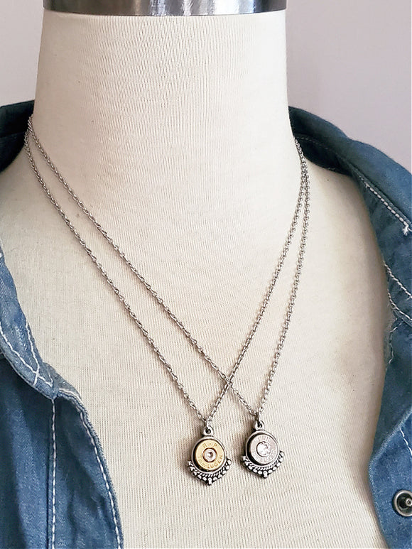 Two Small Caliber Fancy Trimmed Pendant Bullet Necklaces shown on mannequin