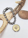 12 Gauge Shotshell Big Ball Chain Silver Charm Bracelet displayed on a deer antler.