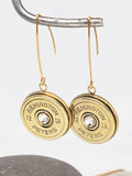 Gold 12 gauge shotshell earrings on marquis ear wires made from vintage Remington Peters casings.