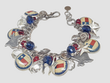 One of a kind Texas loaded charm bracelet with vintage Texas flag charms, stars, crystals, beads, pistol charms and spent bullet casings