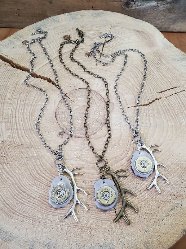 N-323 Silver Plated Antler Necklace with Dangle Bullet Charm. Your N-323 Silver Plated Antler Necklace with Dangle Bullet Charm. Your
